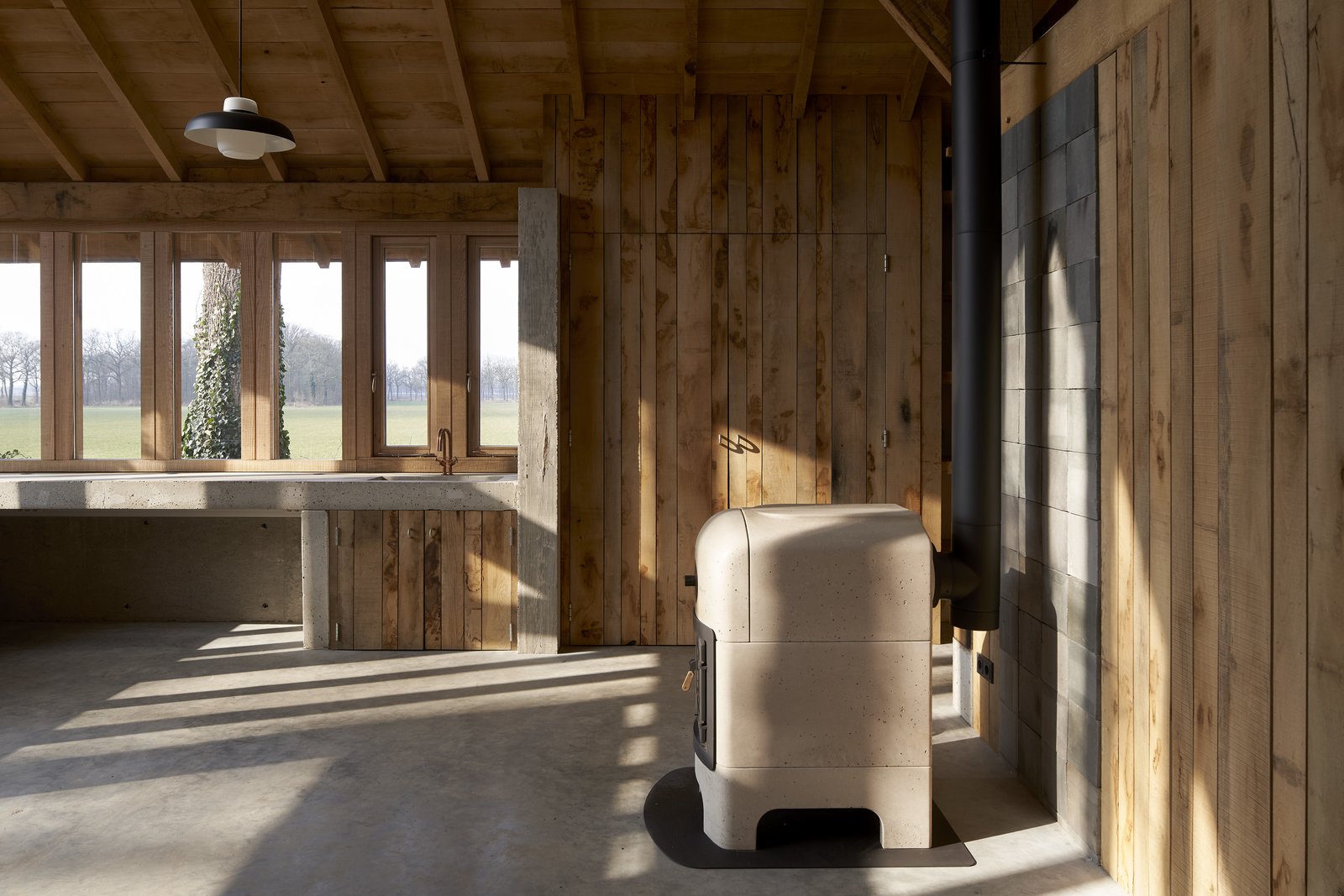 Photo 6 of 10 in This Charming Wooden Barn in the Netherlands Utilizes  Every Part of the Tree - Dwell