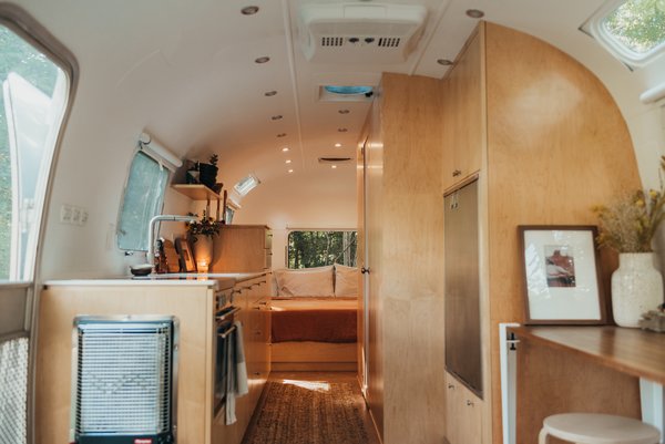 After spending an adventurous summer traveling in a van with their dog, Richmond, Virginia–based couple Grace Kuhn and David Phinney wanted to take their van life adventures to the next level with an Airstream trailer.