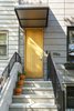 Modern home with Outdoor and Front Yard. The main entry with custom awning. Photo 2 of Sunset Park Row House