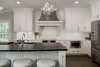 Modern home with Kitchen. Both traditional and contemporary elements define this kitchen. Photo 3 of Chic Black and White Kitchen in Charlotte, NC