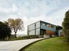 Modern home with Exterior and Prefab Building Type. Settled on a picturesque hillside in Orinda, California, the Connect 8+2 has a warm, welcoming energy with a clean, modern edge. Photo of Orinda Connect 8+2
