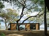 Modern home with Exterior, Flat RoofLine, Prefab Building Type, Wood Siding Material, and Glass Siding Material. Settled on a picturesque hillside in Somona, California, the Connect 5 has a warm, welcoming and peaceful energy with a clean, modern edge. Photo of Connect 5 Sonoma
