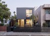 Modern home with Outdoor, Vertical Fences, Wall, Front Yard, Shrubs, Large Patio, Porch, Deck, Trees, Hardscapes, Wood Patio, Porch, Deck, Decking Patio, Porch, Deck, and Wood Fences, Wall. The exterior of Connect 4L 1,600 sf 3 bed 3 bath 2 story modern prefab. Photo of Santa Monica Connect 4L