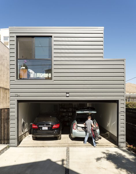 Interior of attached garage with car charging stations built in.