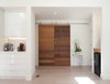 Modern home with Kitchen, White Cabinet, Quartzite Counter, Vinyl Floor, and Recessed Lighting. office/ guest room/ T.V. room closed by Barn door Photo 4 of White House