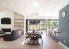 Modern home with Dining Room, Recessed Lighting, Pendant Lighting, Accent Lighting, Vinyl Floor, Table, Chair, and Bar. Great room - vaulted ceiling Photo 11 of White House