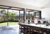 Modern home with Dining Room, Recessed Lighting, Chair, Vinyl Floor, and Table. Dining area open to the side yard Photo 2 of White House