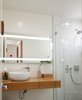 Modern home with Bath Room, Porcelain Tile Floor, Pedestal Sink, Quartzite Counter, Recessed Lighting, Corner Shower, Porcelain Tile Wall, One Piece Toilet, and Wall Lighting. Powder room Photo 13 of White House