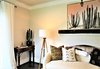 Modern home with Living Room, Console Tables, Sofa, Floor Lighting, Ceiling Lighting, Medium Hardwood Floor, and Dark Hardwood Floor. Living Room Photo 6 of A 1920's English Cottage