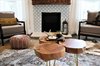 Modern home with Coffee Tables, Ottomans, Chair, Ceiling Lighting, Medium Hardwood Floor, Dark Hardwood Floor, Standard Layout Fireplace, Wood Burning Fireplace, and Bath Room. Coffee table and chairs Photo 8 of A 1920's English Cottage