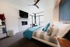 Modern home with Bedroom, Bed, Night Stands, Chair, Shelves, Ceiling Lighting, Track Lighting, and Carpet Floor. Master Bedroom Photo 18 of Project 2575