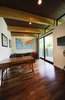 Modern home with Office, Chair, Desk, Study Room Type, and Medium Hardwood Floor. Upstairs office suite with personal balcony Photo 17 of Project 2575