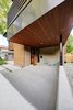 Modern home with Exterior, House Building Type, Mid-Century Building Type, Wood Siding Material, Brick Siding Material, Concrete Siding Material, Metal Siding Material, and Stucco Siding Material. Front exterior Photo 7 of Project 2575