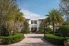 Modern home with Exterior and House Building Type. Front Exterior:The six-bedroom home blends a Spanish Mediterranean exterior with a modern transitional interior. Photo 4 of 5139 Fairway Oaks Drive