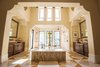 Modern home with Bath Room. Master Bathroom: Find a true pièce de résistance in the master suite, where a two-story closet sits in perfect accompaniment to the island soaking tub and walk-through shower. Photo 7 of 5139 Fairway Oaks Drive