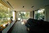 Modern home with Living Room, Coffee Tables, Sofa, Accent Lighting, Ceiling Lighting, and Medium Hardwood Floor. Living room Photo 6 of House at Los Cisnes