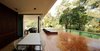 Modern home with Outdoor, Trees, Back Yard, Large Patio, Porch, Deck, Large Pools, Tubs, Shower, Wood Patio, Porch, Deck, Concrete Patio, Porch, Deck, Metal Patio, Porch, Deck, and Decking Patio, Porch, Deck. Wooden deck and pool Photo 2 of House at Los Cisnes