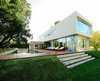 Modern home with Outdoor, Back Yard, Grass, Trees, Large Patio, Porch, Deck, Metal Patio, Porch, Deck, Large Pools, Tubs, Shower, Concrete Patio, Porch, Deck, Wood Patio, Porch, Deck, and Decking Patio, Porch, Deck. Pool, wooden deck and garden. Photo 3 of House at Los Cisnes
