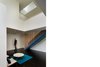 South-facing roof apertures capture and direct daylight deep into the north-facing playroom and porch. Photo 5 of Suburban Bungalow Grows Up modern home