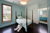 Side-by-side bedrooms for the children are connected through a ‘Jack & Jill’ bathroom. Photo 9 of Suburban Bungalow Grows Up modern home
