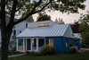 Scale – In contrast to the swollen 'farm' houses sprouting up in many suburban areas, the renovation builds upon the existing architecture, highlighting the intimacy and charm of the cottage-scaled older home. Photo 18 of Suburban Bungalow Grows Up modern home