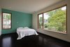 The new Master Suite has expansive views towards the garden and mature trees. Photo 10 of Suburban Bungalow Grows Up modern home