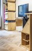 Modern home with Bedroom and Storage. All of the shelving in the space is uniquely modular -- storage spaces can either be open to eliminate extra tidying and packing time or rotated closed to pack rarely-used belongings Photo 5 of Micro live:work studio