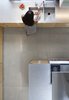 Modern home with Kitchen, Range, Wood Cabinet, and Concrete Floor. polished concrete floors and stainless steel countertops Photo 5 of 6th Street