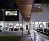 Modern home with Exterior, Wood Siding Material, Metal Siding Material, House Building Type, Gable RoofLine, and Metal Roof Material. Walkway and back yard at Residence 1414 by Miró Rivera Architects Photo 5 of Residence 1414