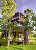 Modern home with Exterior, Flat RoofLine, House Building Type, Metal Siding Material, Metal Roof Material, and Curved RoofLine. Exterior view at Guest House by Miró Rivera Architects Photo 2 of Guest House