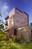 Modern home with Exterior, House Building Type, Metal Roof Material, Metal Siding Material, Curved RoofLine, Stucco Siding Material, and Flat RoofLine. Exterior view at Guest House by Miró Rivera Architects Photo 3 of Guest House