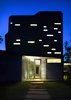 Modern home with Exterior, Flat RoofLine, Curved RoofLine, Metal Siding Material, House Building Type, and Metal Roof Material. Entry at Guest House by Miró Rivera Architects Photo 10 of Guest House
