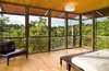 Modern home with Bedroom, Bed, Chair, Light Hardwood Floor, Pendant Lighting, and Ceiling Lighting. Bedroom at Guest House by Miró Rivera Architects Photo 6 of Guest House