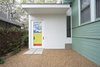 Modern home with Exterior, Wood Siding Material, Shingles Roof Material, Flat RoofLine, and House Building Type. Front door at the 1917 Bungalow by Miró Rivera Architects Photo 2 of 1917 Bungalow