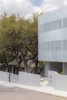 Modern home with Exterior, Metal Siding Material, Flat RoofLine, and House Building Type. Designed for a couple of empty-nesters on a modest budget, the home’s contemporary aesthetic is balanced by the desire to respect the scale of the existing neighborhood. Photo 2 of Edgecliff Residence
