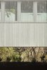 Modern home with Exterior, Metal Siding Material, and House Building Type. From the street, the Edgecliff Residence is characterized by a rainscreen made of galvanized electrical conduit—an inventive, low-cost solution that addresses several practical needs. Photo 4 of Edgecliff Residence