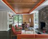 Modern home with Living Room, Coffee Tables, Floor Lighting, Standard Layout Fireplace, Sofa, and Wood Burning Fireplace. Main Living Space houses our collection of Mid-Century Modern Furniture Photo 3 of DeSilver House by John Black Lee + Harrison DeSilver | 1961