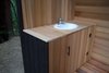 The raw cedar came from Craigslist and the sink reclaimed from the local Rebuilding center. Faucet is Kohler. Photo 7 of The Cube modern home