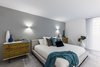 Modern home with Bedroom, Wall Lighting, Bed, Storage, Night Stands, Accent Lighting, Recessed Lighting, Concrete Floor, and Rug Floor. platform bed , wooden side table , modern bedroom By Mila design Photo 4 of Riviera Miami Beach