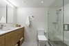 Modern home with Bath Room, Ceiling Lighting, One Piece Toilet, Concrete Wall, Accent Lighting, Concrete Floor, Wall Lighting, Undermount Sink, and Engineered Quartz Counter. modern , vanity custom designed by nathalie milazzo , Frameless shower glass , shower system by Hansgrohe Photo 7 of Riviera Miami Beach