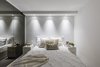 Modern home with Bedroom, Bed, Wall Lighting, Night Stands, Ceiling Lighting, Concrete Floor, and Recessed Lighting. One way Mirror glass partition , nathalie milazzo Photo 8 of Riviera Miami Beach
