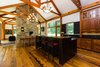 Modern home with Dining Room and Two-Sided Fireplace. Kitchen Photo 3 of Contemporary Farmhouse