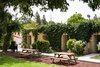 Modern home with Outdoor, Front Yard, Grass, Wood Fences, Wall, and Hanging Lighting. The outdoors of the guest rooms Photo 16 of Golden apple guest rooms