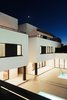 Modern home with Exterior, House Building Type, Tile Roof Material, Stucco Siding Material, and Stone Siding Material. WH Residence | M3 Architects Photo 11 of WH Residence
