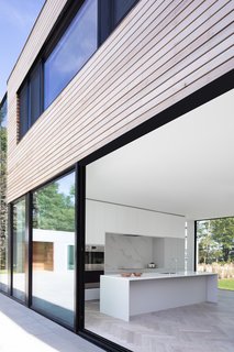 Clean lines and textures add to the monochromatic palette.