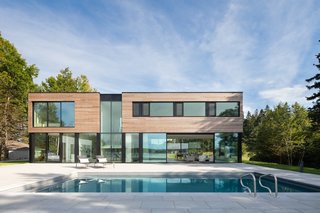 The back of the house is nearly a mirror image of the front—with just a few more windows to take in the views of the ocean.