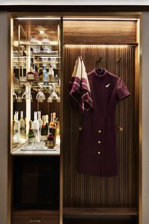 The museum showcases a collection of authentic TWA air hostess uniforms designed by Valentino, Ralph Lauren, and Stan Herman. 