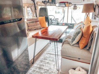 The dining area has a full refrigerator.