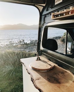A live edge counter adds a warm, inviting feel to the van.