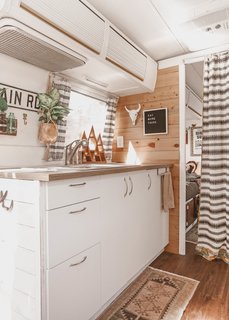 The kitchen is simple and streamlined for easy meal prep.